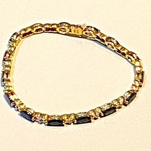 Elegant Gold and Black Bracelet